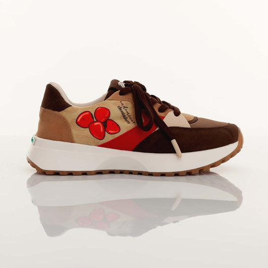 Sneakers únicos inspirados en chontaduro y anón. Energía y frescura colombiana en cada paso. ¡Hazlos tuyos hoy en Macondas!
