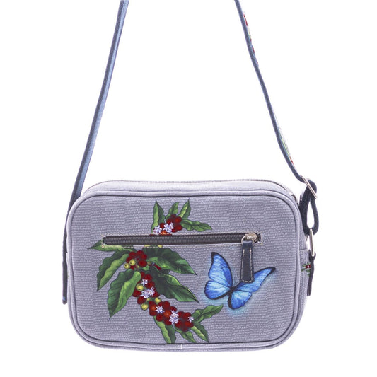 Bolso ideal para viajes, con ilustraciones de café y mariposas azules. Macondas