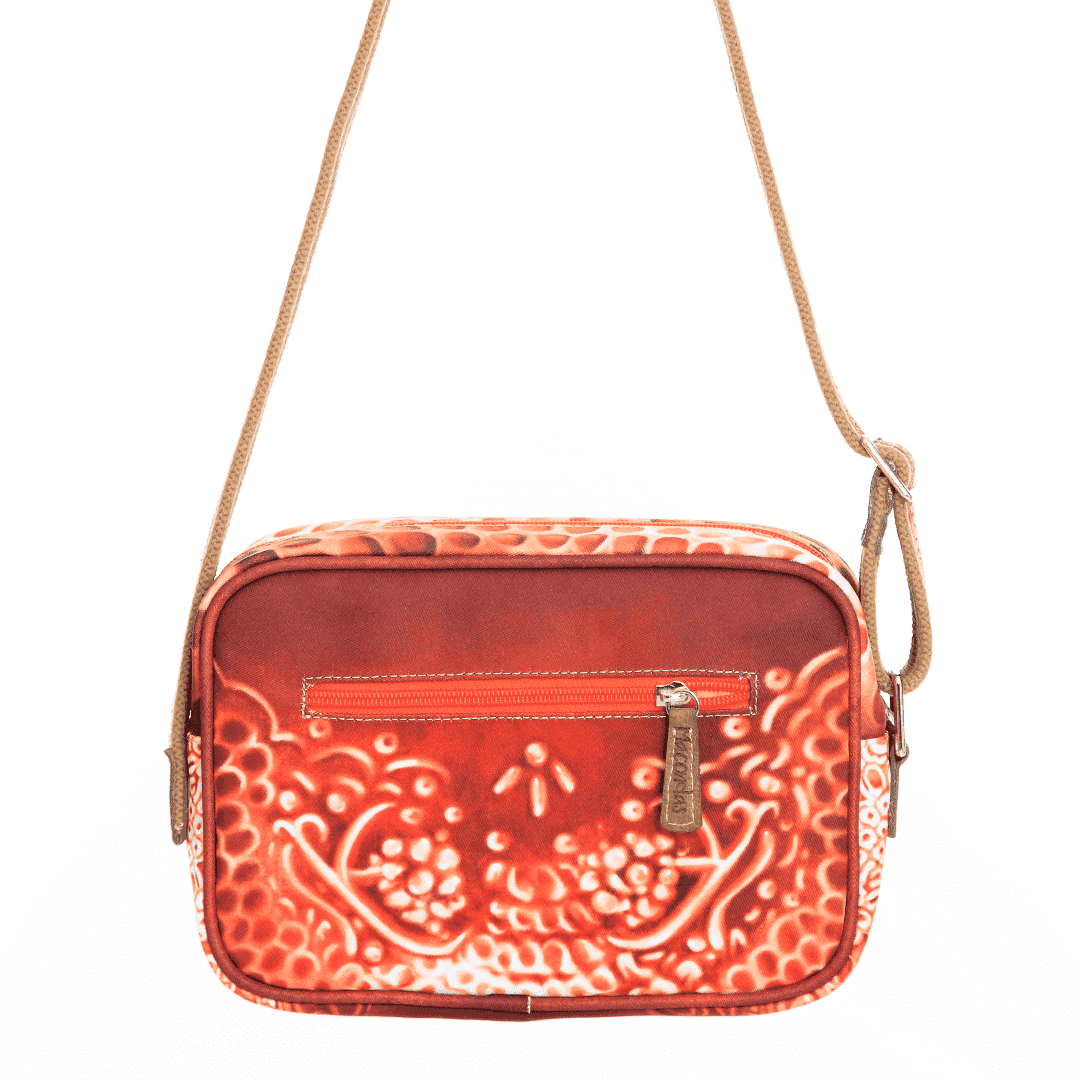 Bolso manos libres color cobre. macondas