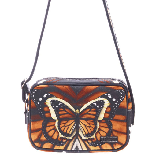Bolso manos libres para dama con ilustraciones de mariposa monarca. ;Macondas