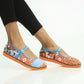 Zapatos con correa  artesanales, ilustrados con historias de Colombia.  Mujeres indigeneas Kuna